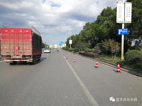 公路養護車高峰作業引擁堵,網友求助上高交警解困擾