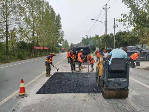 祁陽市公路建設養護中心戰高溫 斗酷暑 保障公路安全暢通